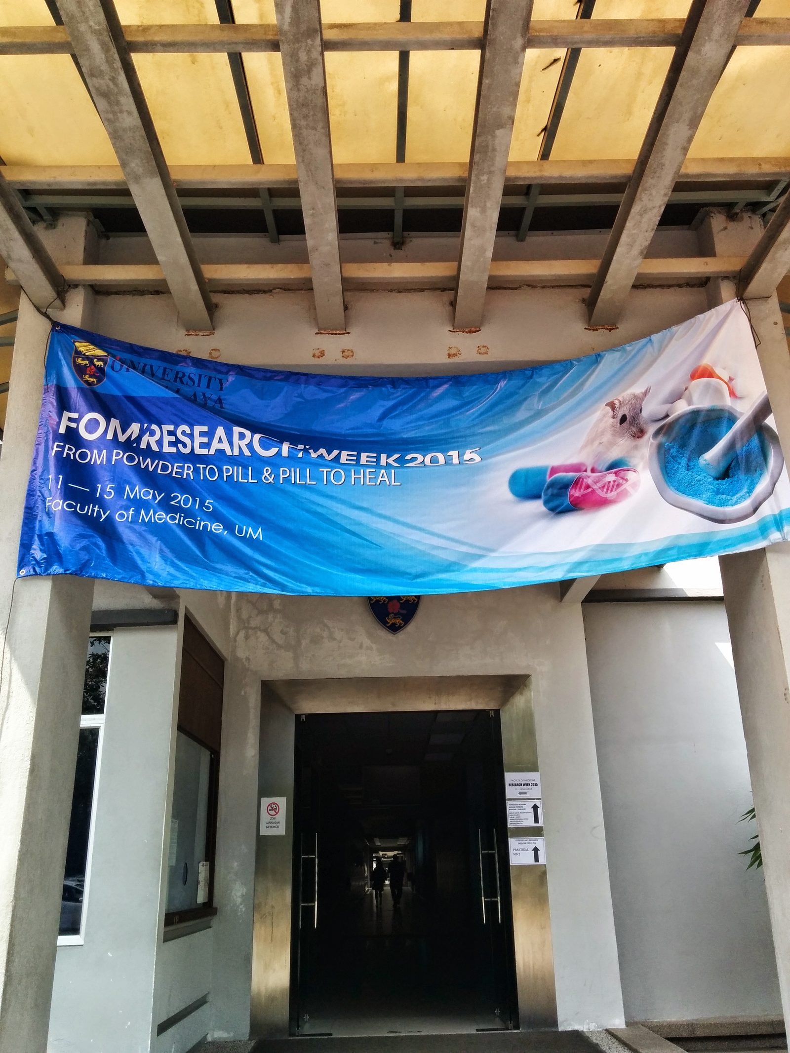 The FOM Research Week 2015 banner hung above a building entrance at the Faculty of Medicine