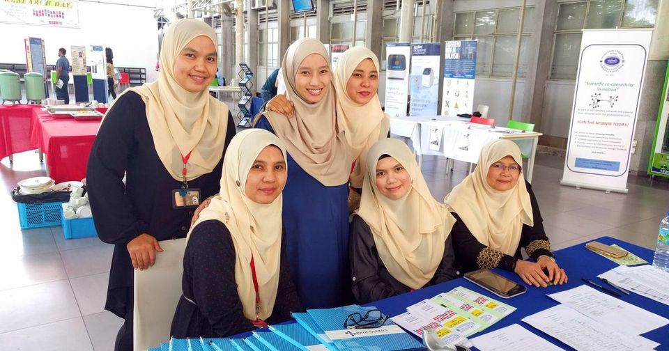 Six women at the registration desk at Centrepoint