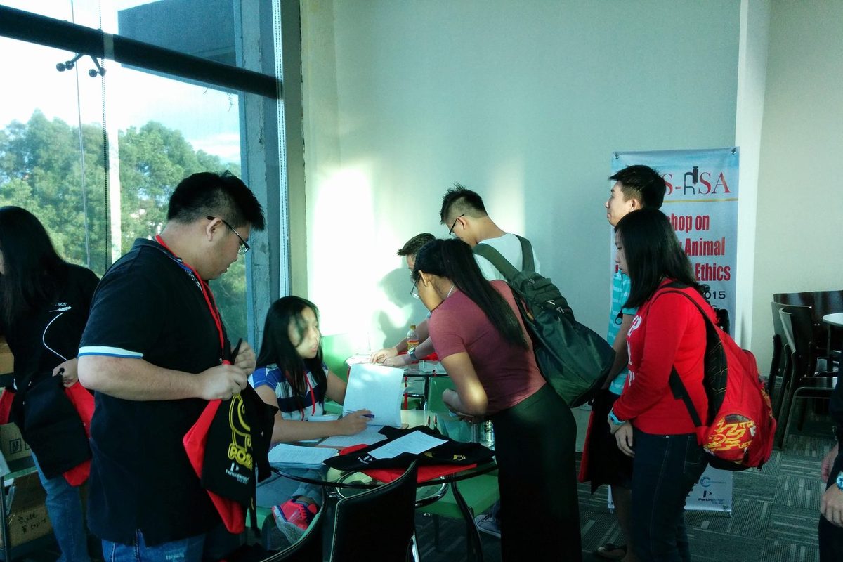 Participants sign in at the registration table of the workshop at UCSI University