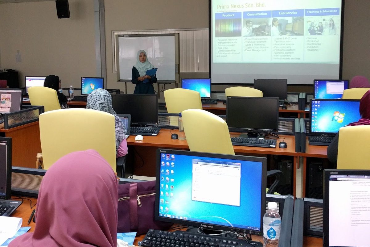 Participants seated at computer desks during the session