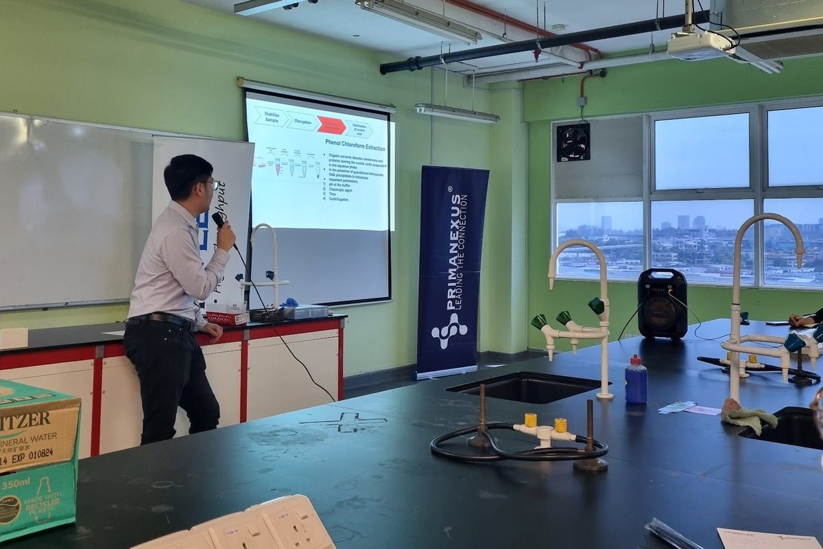 The teaching laboratory, with a presenter at the front and participants at the benches