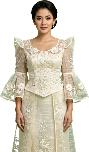 A Filipino woman in an ivory Filipiniana gown